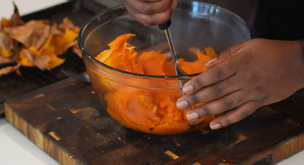 Bake them until fork tender before peeling and mashing into a smooth puree.