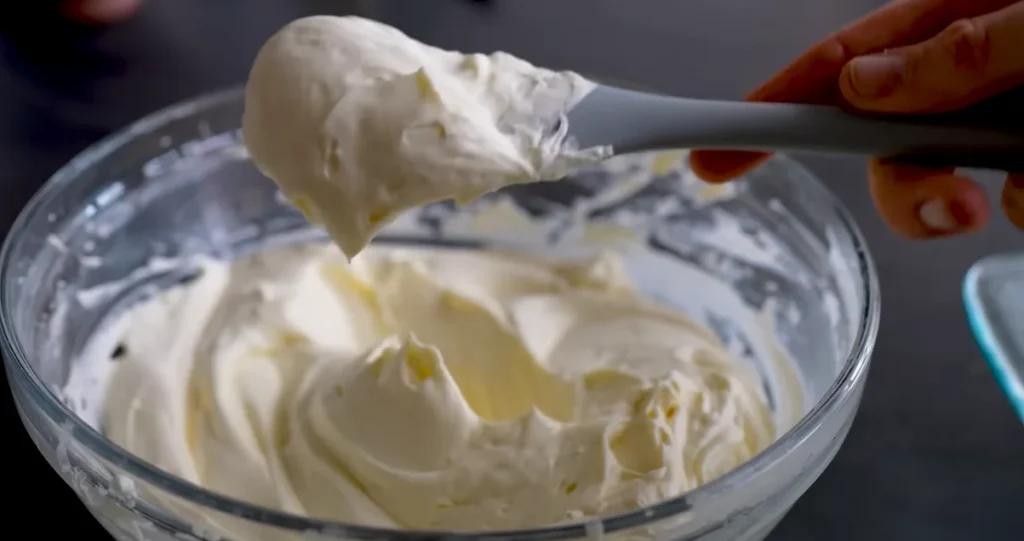 Whipped cream mixture beaten to stiff peaks for Cherry Yum Yum