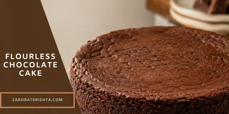 A homemade flourless chocolate cake on a simple serving plate