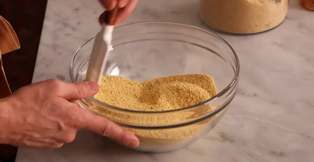 Graham cracker crumbs in a bowl for Banoffee Pie crust