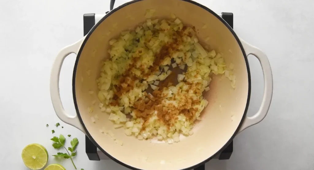 Cumin, chili powder, smoked paprika and seasonings added to sautéed onions