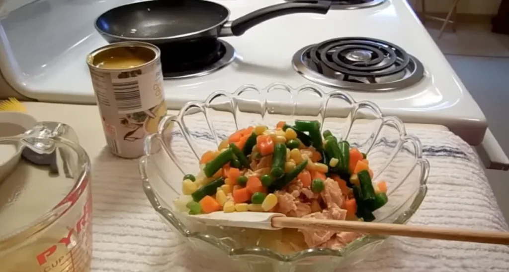 Chicken pot pie casserole vegetables sautéing in butter
