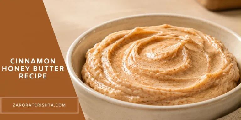 A small neutral ceramic dish filled with creamy homemade cinnamon honey butter, with subtle cinnamon flecks, styled on a warm kitchen counter in soft natural light.