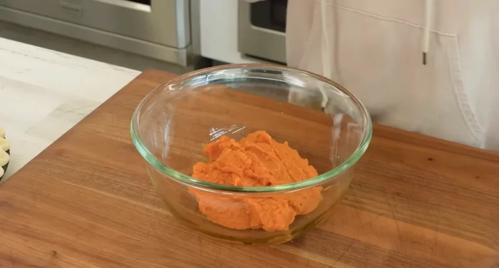 Fresh pumpkin puree in a glass bowl for homemade pumpkin pie
