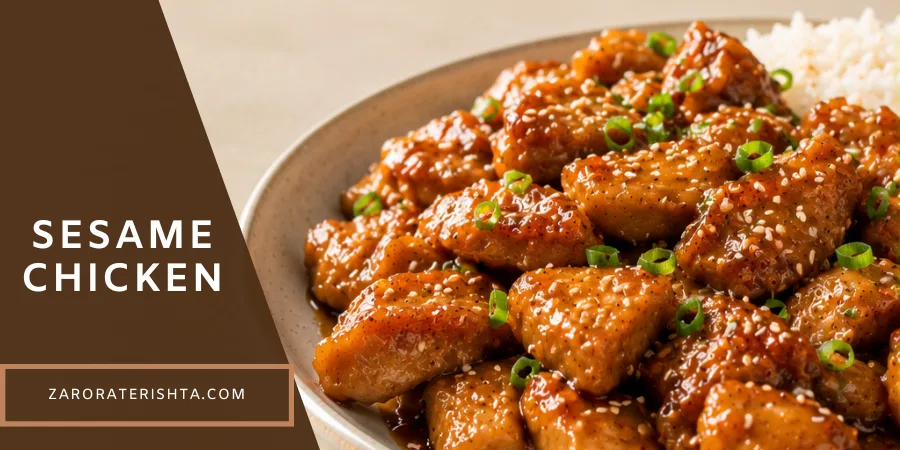 Sesame chicken with glossy honey sesame sauce, sesame seeds, and green onions served with white rice