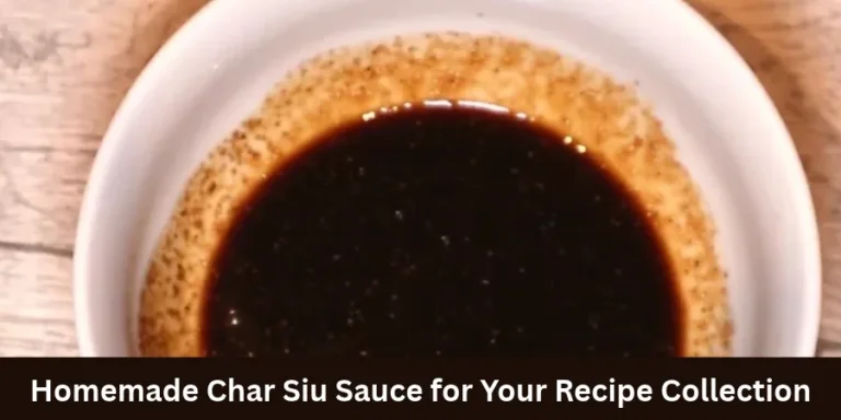 A top-down view of a small white ceramic bowl filled with a dark, thick brown sauce or liquid, placed on a light-colored wooden surface.